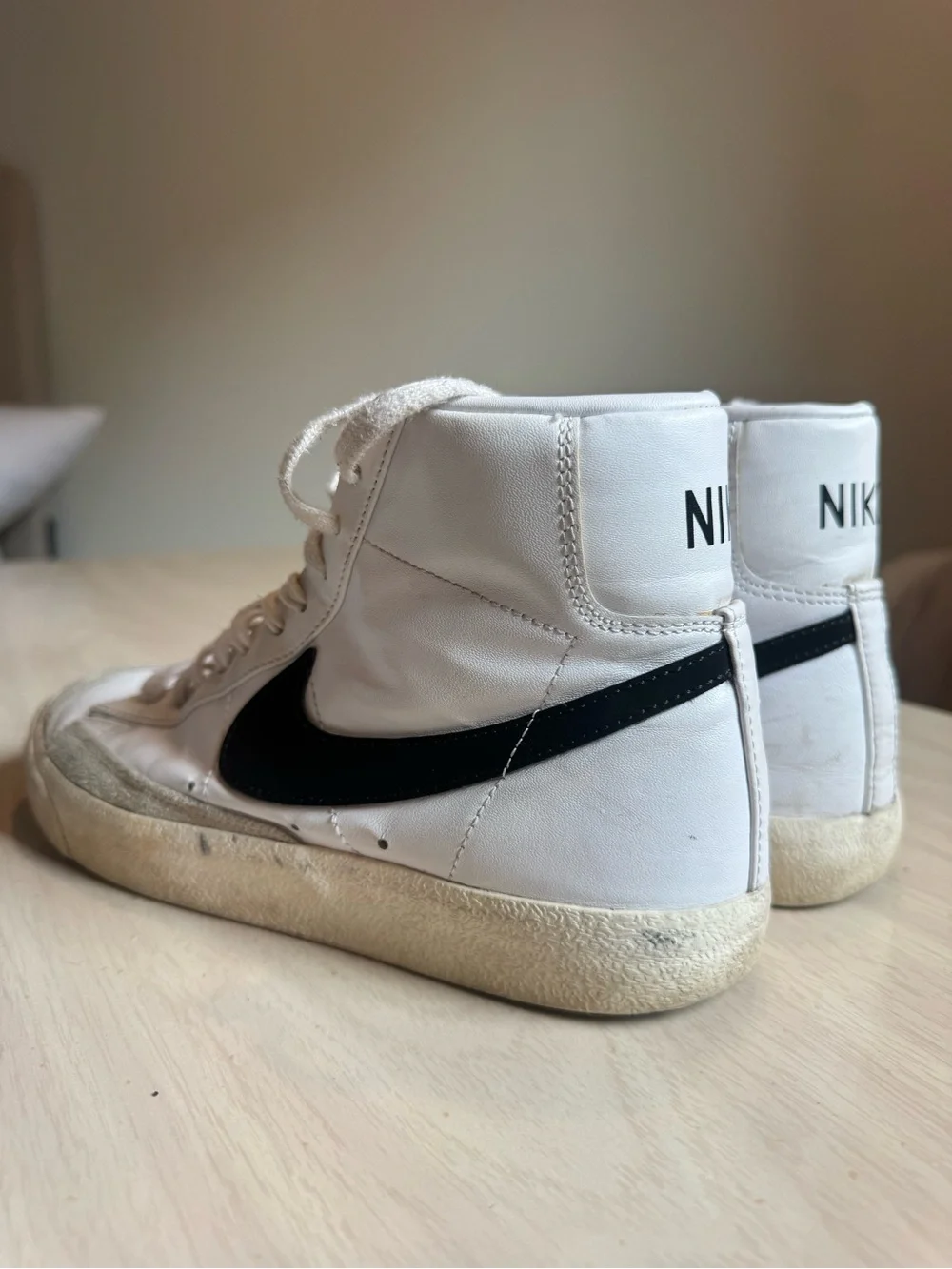 Nike White Women’s High-Top Sneakers with Black Stripe